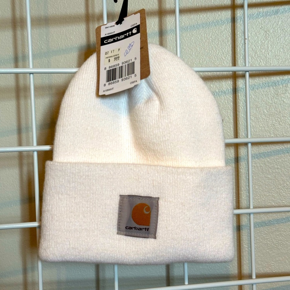White Carhart winter hat. New with tags. Smoke free home.